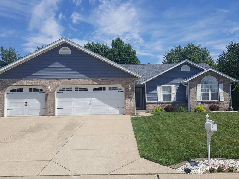 Image of house by JF Roofing and Seamless Gutters, LLC